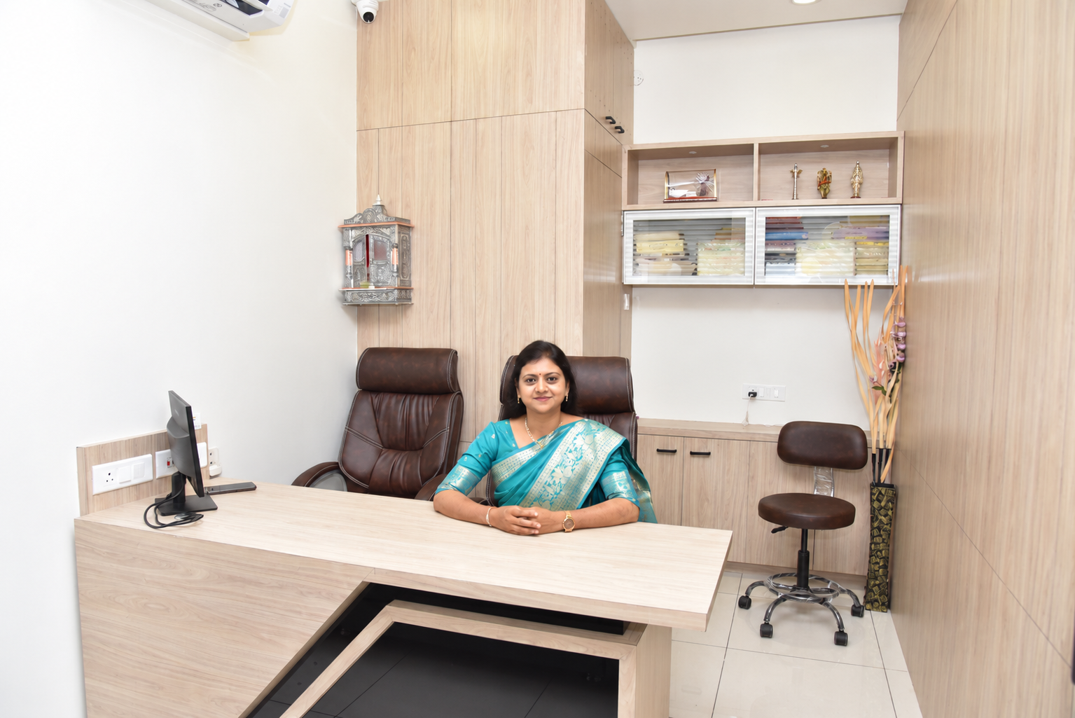 Dr. Khyati B. Mungara, Ayurvedic Physician, at her consultation room in Rajkot